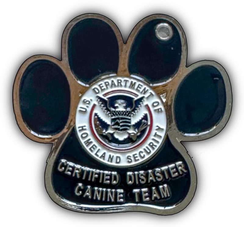 Front of the Certified Disaster Canine Team challenge coin